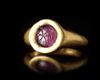 A GOLD RING WITH AN AMETHYST INTAGLIO, 4TH CENTURY AD