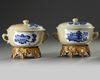 A PAIR OF CHINESE CAFE-AU-LAIT-GROUND BLUE AND WHITE POTICHES AND COVER, KANGXI PERIOD (1662-1722)