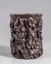 A Chinese wooden brush pot