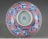 A Chinese puce-enamelled blue and white 'Immortals' bowl