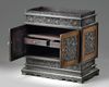 A small Chinese carved zitan cabinet