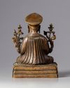 A partial gilt Chinese bronze buddha figure