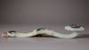 A Chinese hardstone-inlaid pale celadon jade ruyi sceptre