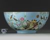 A large Chinese sgraffiato pale-blue-ground famille rose punch bowl
