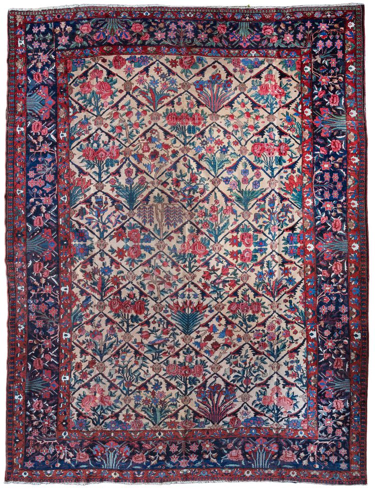 AN UNUSUAL ANTIQUE YELLOW GROUND BAHTIYARI CARPET