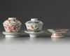 Two Chinese cups, covers, and saucers and a stem dish