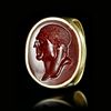 A ROMAN GOLD RING WITH A CARNELIAN INTAGLIO WITH THE PORTRAIT OF A MAN, 1ST BC-AD
