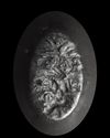 A SARDONYX INTAGLIO WITH A BUST OF JUPITER ABOVE AN EAGLE, 1ST CENTURY AD