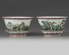 A pair of Chinese famille rose jardinieres and stands