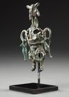 A WESTERN ASIATIC AMLASH OPENWORK BRONZE IDOL, CIRCA 1ST MILLENNIUM B.C.