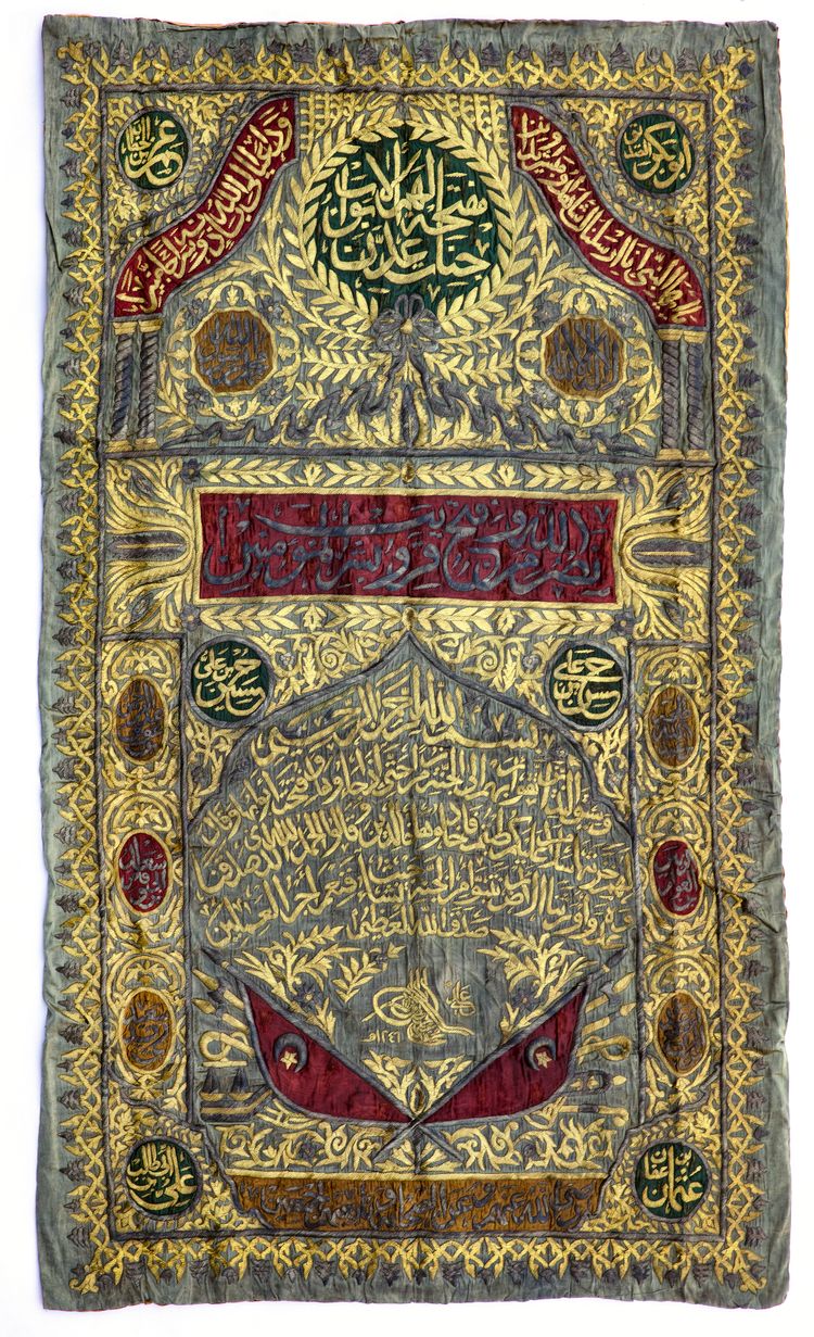 AN OTTOMAN METAL THREAD EMBROIDERED CURTAIN WITH THE TUGHRA OF MAHMUD II AND DATED 1246 AH/1830 AD