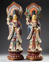 A PAIR OF CHINESE POLYCHROME PAINTED WOODEN CARVED FIGURES OF GUANYIN, EARLY 20TH CENTURY