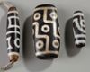 Three Tibetan Dzi beads
