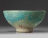An Islamic turquoise glazed bowl