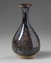 A CHINESE BLACK GLAZED RUST-SPLASHED PEAR-SHAPED VASE, SONG-STYLE