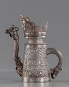 A TIBETAN RITUAL SILVER EWER, 19TH CENTURY