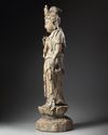 A large Chinese polychrome-decorated wood carving of Guanyin