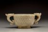 A celadon jade twin-handled cup
