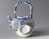 A Chinese blue and white double wall reticulated teapot