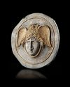 A ROMAN GILT SILVER PHALERA WITH WINGED HEAD OF MEDUSA, 1ST-2ND CENTURY AD