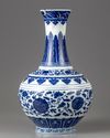 A blue and white bottle vase