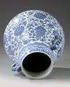 A Chinese blue and white 'Eight Buddhist Emblems' pear-shaped vase, hu