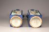 A pair of powder-blue-ground famille verte square-section vases, cong