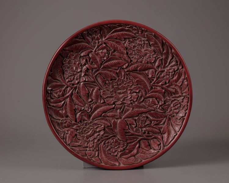 A Chinese cinnabar lacquer 'peony' dish