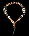 A TIBETAN AGATE BEADED BRACELET, 20TH CENTURY