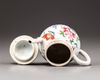 A Chinese famille rose teapot and cover