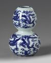 A Chinese blue and white ‘dragons’ double gourd vase