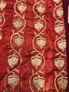AN OTTOMAN EMBROIDERED DEEP RED SILK PANEL