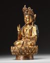 A  Chinese gilt-bronze figure of Avalokitesvara