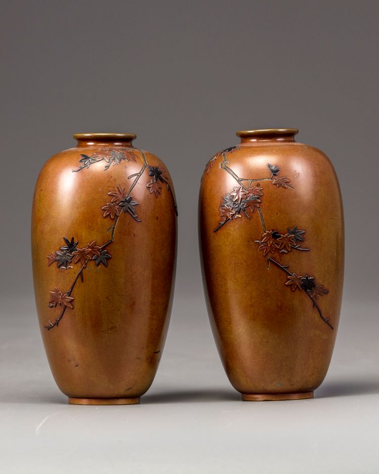 A pair of Japanese bronze vases