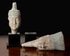A PAIR OF CHINESE TERRACOTTA HEADS OF A MAN AND WOMAN, MING DYNASTY (1368–1644)