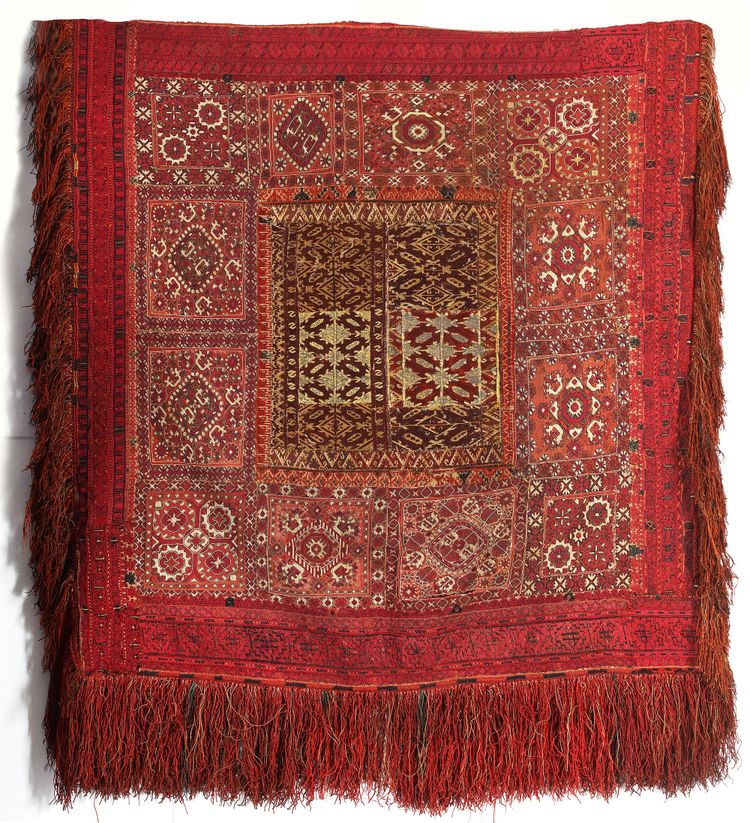 A PATCHWORK EMBROIDERED SQUARE CARPET