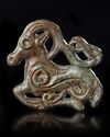 A SEATED MYTHOLOGICAL BRONZE RAM, ORDOS PERIOD
