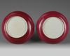 A pair of Chinese famille rose ruby-back 'bird and flower' dishes