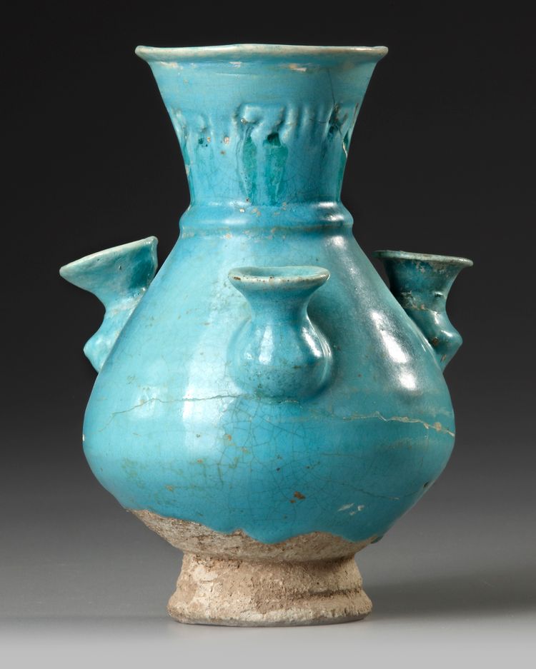 A KASHAN TURQUOISE GLAZED POTTERY VASE, PERSIA, 13TH CENTURY