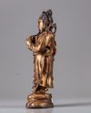 A gilt  bronze figure of Guanyu