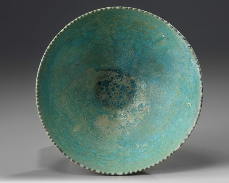 An Islamic turquoise glazed bowl