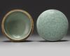 A KOREAN CELADON-GLAZED 'PEONIES' ROUND BOX AND COVER