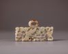 A Chinese celadon jade openwork 'geese' plaque
