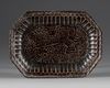 A CHINESE CIZHOU-TYPE BLACK-GLAZED INCISED TRAY, SONG DYNASTY (960-1279)