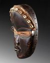 AN AFRICAN MASK, EARLY 20TH CENTURY