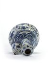 A Chinese blue and white moulded ‘Kraak porselein’ kendi