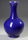 A CHINESE POWER BLUE GLAZED BOTTLE VASE, QING DYNASTY (1644-1911)