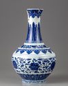 A blue and white bottle vase
