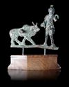A BRONZE APPLIQUE OF A PAN AND A BULL, HELLENISTIC, 2ND-1ST CENTURY BC