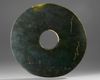 A NEOLITHIC JADE BI DISC, CHINA